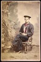 Hand-tinted cabinet photograph of a sailor