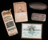 Collection of Midwinter International Exposition material, including coins, pins, spoons, glass-ware, paper weights, etc.