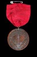 An original golf medal, awarded for the Mens Foursome at Cohasset Golf Club, dated June 18, 1900