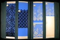 3 large folios with examples of fabric patterns and designs