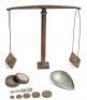 Two gold scales and a hydrometer