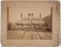 Mammoth plate photograph of the Ferry "Solano" with passengers and crew members, plus two onboard trains visible