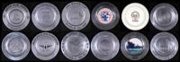 Collection of 12 commemorative golf plates