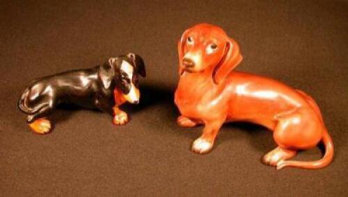 Two ceramic daschunds