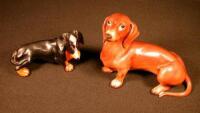 Two ceramic daschunds