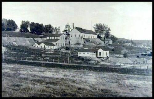 Share book of the Mining Co., and an original framed photograph of the Mine