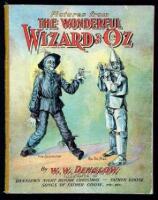 Pictures from the Wonderful Wizard of Oz...with a story telling the Adventures of the Scarecrow, the Tin Man and the Little Girl by Thos. H. Russell