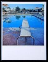 Nine Swimming Pools and a Broken Glass