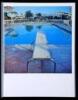 Nine Swimming Pools and a Broken Glass