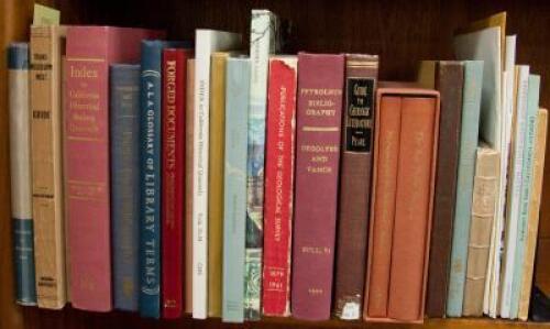 Shelf of miscellaneous books about books