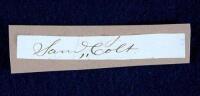 Scarce signature &ldquo;Saml. Colt&rdquo; on a .5&rdquo; x 3.5&rdquo; slip of off-white paper.