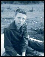 Untitled (Young Boy Sitting)