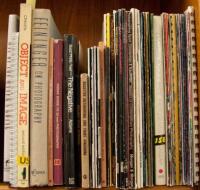 Shelf of photography books and magazines