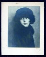 Silver photograph of a woman wearing a fur-lined coat and hat