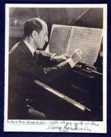 Photograph of Gershwin, inscribed & signed by him in the lower margin