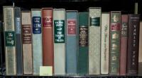 Shelf of illustrated volumes published by the Heritage Press