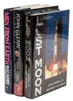 Three volumes on space travel and exploration, signed by three American astronauts