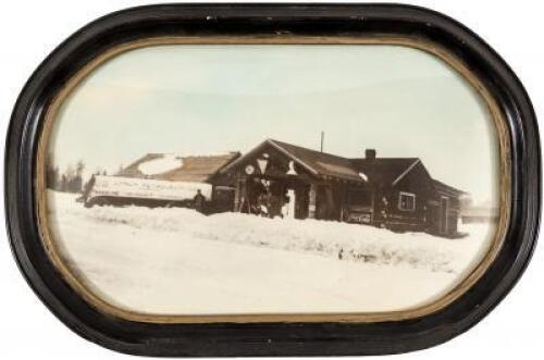 Original photograph of a tanker truck delivering gasoline to a rural Colorado gas station in the snow