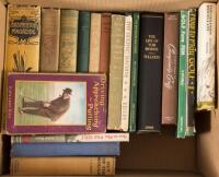 Shelf of eighteen volumes about golf