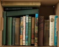 Shelf of eighteen volumes on golf