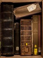 Shelf of six volumes of Bibles and religious works, most large