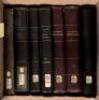 Shelf of 7 large volumes relating to Jean Calvin