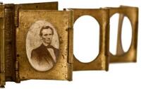 Miniature original photograph of a beardless Abraham Lincoln housed in locket