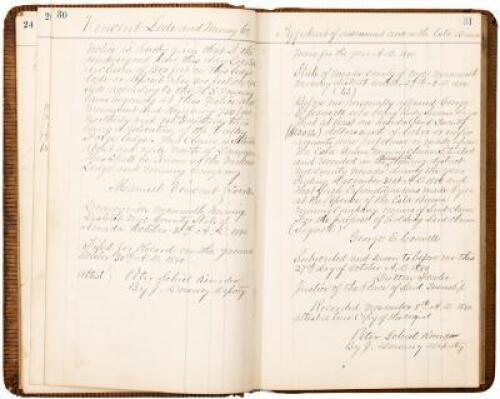 Manuscript ledger book recording mining claims and locations for numerous mines in the Mammoth Mining Districe, Nye County, Nevada