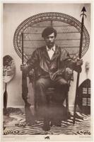 Large poster of Huey P. Newton for the Black Panthers - the famous photograph of him seated in a wicker chair with two weapons