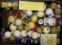 Shelf of vintage golf balls