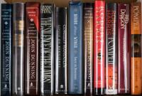 Shelf of works by John Dunning, Louis de Berni&egrave;res and Robert Harris