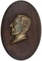 Antique metal and wood silhouette of President Woodrow Wilson