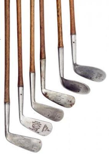 Six Tom Stewart wood shafted clubs