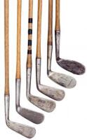 Six hickory shafted Tom Stewart and St. Andrews irons