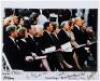 Photograph of the five living Presidents of the United States and the First Ladies at the Funeral of Richard Nixon, signed by all ten