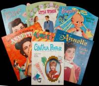 Fourteen paper doll books, six of them with Disney connections