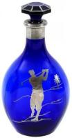 Blue glass decanter, with silver overlay depicting a golfer