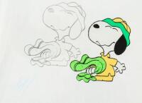 Original animation cel and production drawing of Snoopy in his tennis attire
