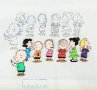 Original animation cel and production drawing of the Peanuts gang