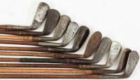 Twenty-one hickory shafted Tom Stewart at St. Andrews irons