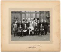 Original photograph of Thomas Edison with a group of employees at outside his West Orange, New Jersey laboratory