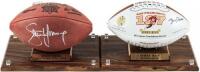 Two footballs signed by Jerry Rice and Steve Young, respectively