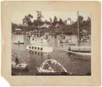 Queen Anita's Barge with Queen and Her Court passing the Throne, Santa Cruz Water Carnival, June, 1895