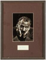 Signature of John Steinbeck, matted and framed with a portrait