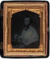 Ambrotype of a blacksmith, in thermoplastic union case inset with carved gem