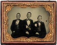 Ambrotype of three young men in fancy dress, thought to be graduates of the Carlisle Indian School