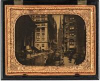 Orotone of Wall Street with Federal Hall & the statue of George Washington, in earlier thermoplastic Union case with leaf design