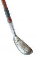 Putter with lion cleek mark