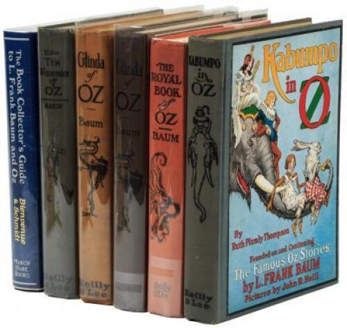 Five Oz titles by L. Frank Baum and Ruth Plumly Thompson, plus Bienvenue & Schmidt's Oz bibliography