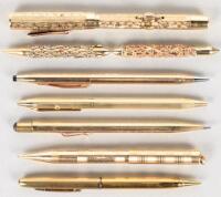 Eight gold filled fountain pens and mechanical pencils